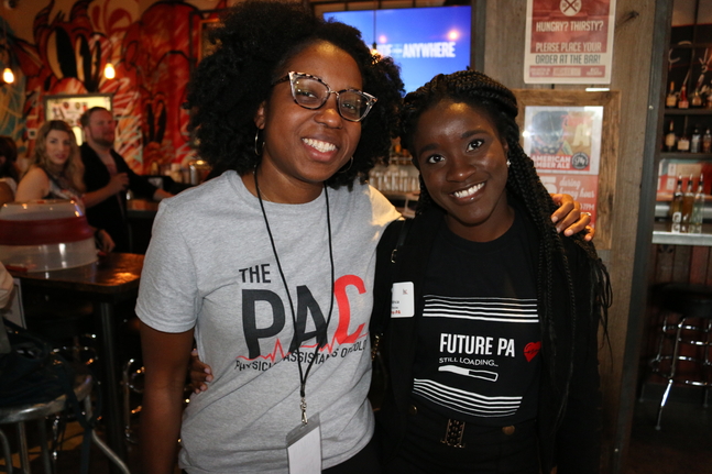 Samora Charles, PA-C, and a PA student at The PAC Movement's event